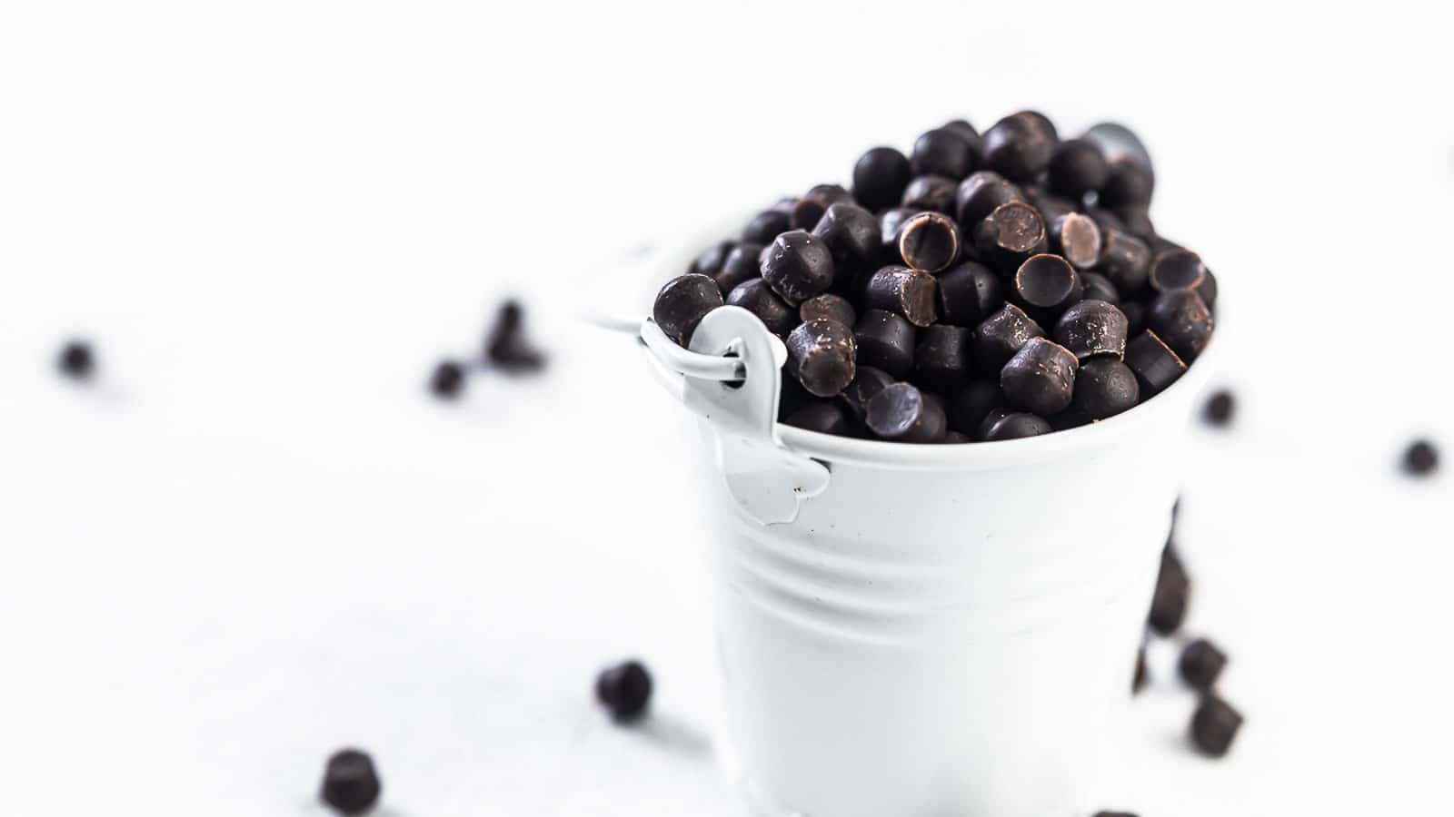 Sugar-Free Chocolate Chips inside white bucket.