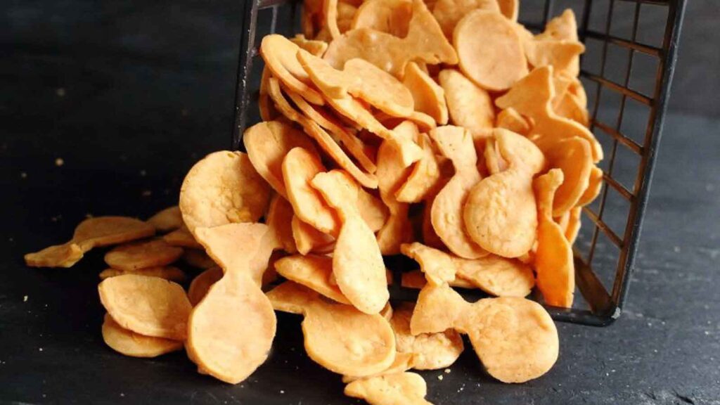 Fish crackers in a basket on a table.