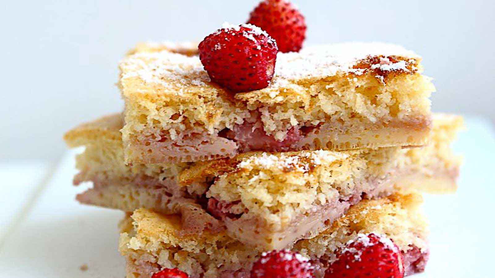 Strawberry Coffee Cake pieces on top of each other. 