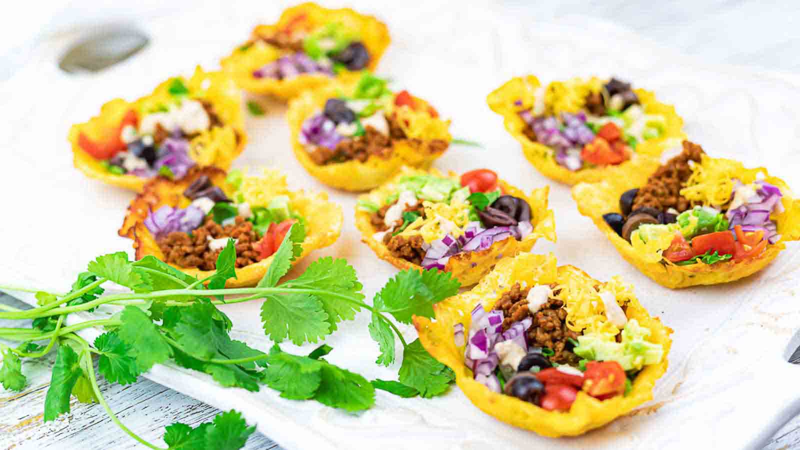 Mexican tortilla cups on a white plate.