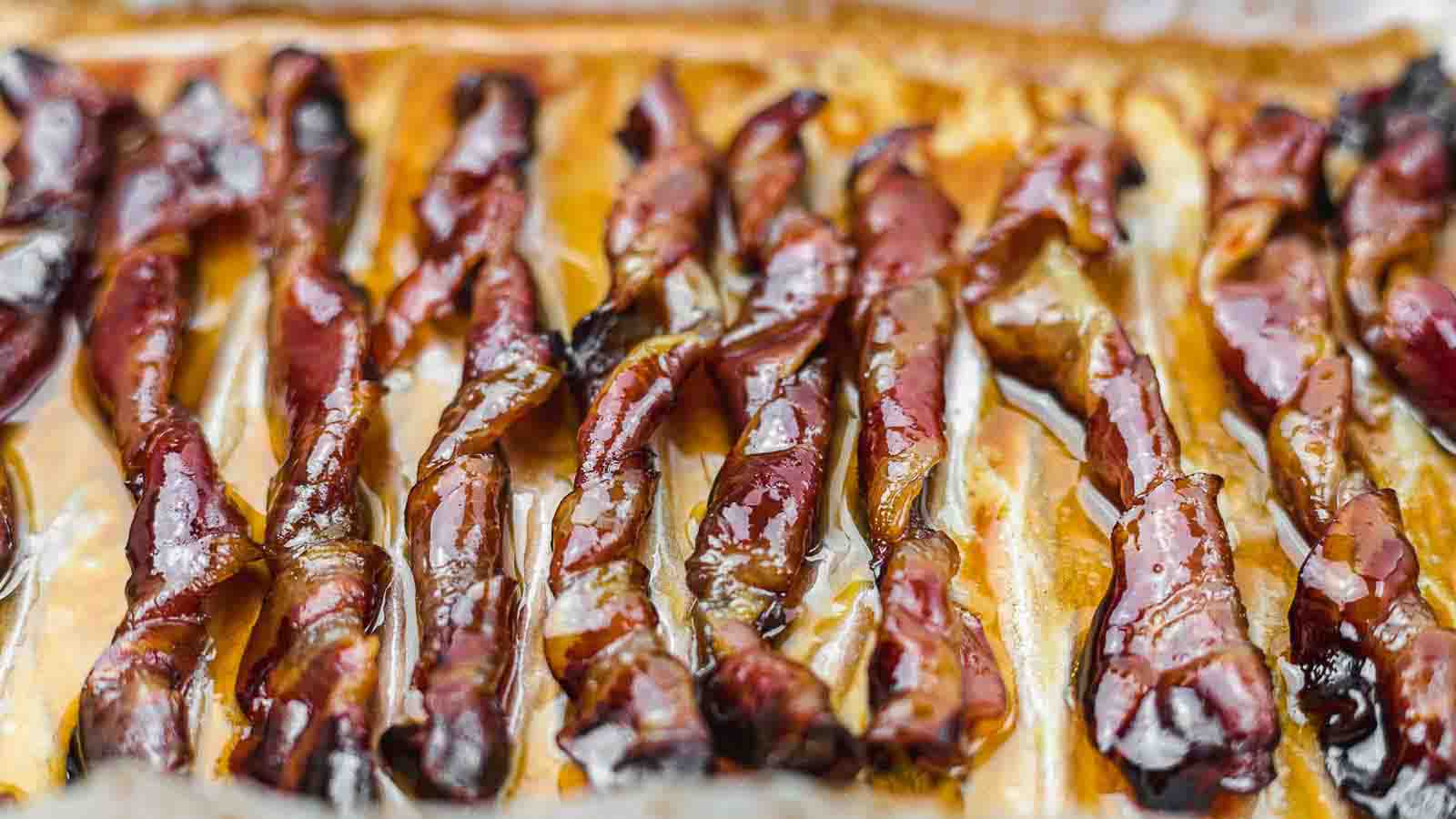 Candied Bacon Twists on a parchment paper.