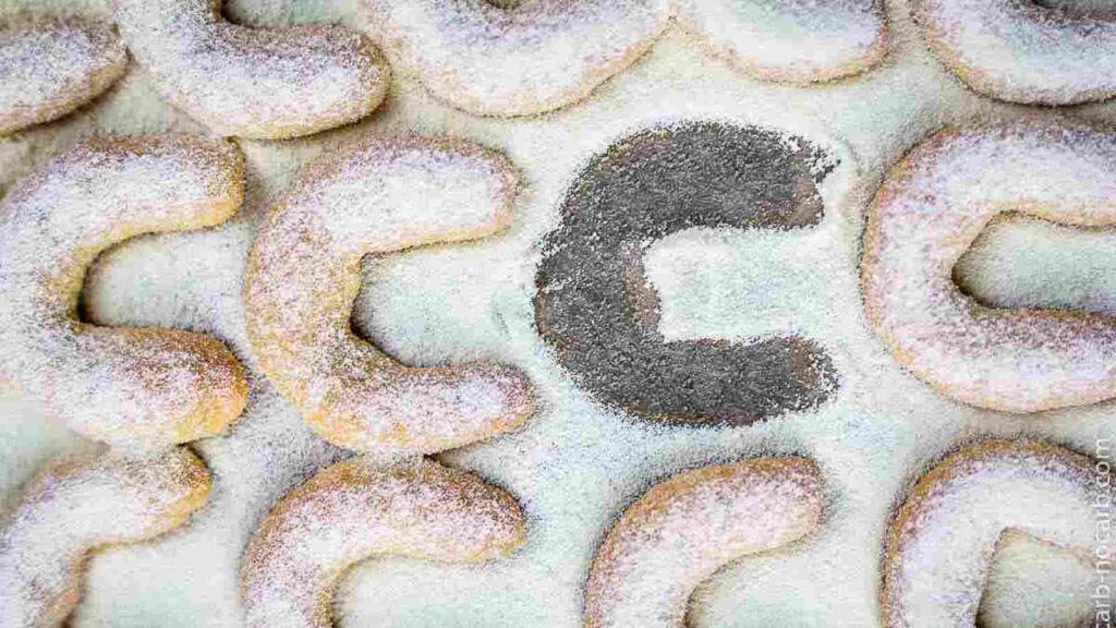 A group of cookies shaped like the letter c.