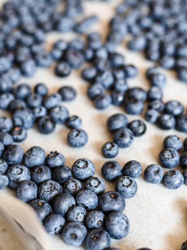 Blueberries on a baking sheet.