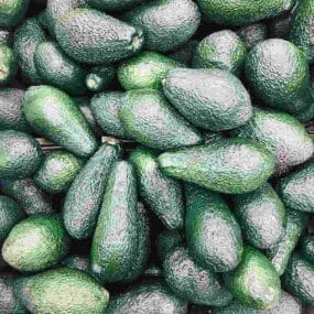 A pile of green avocados.