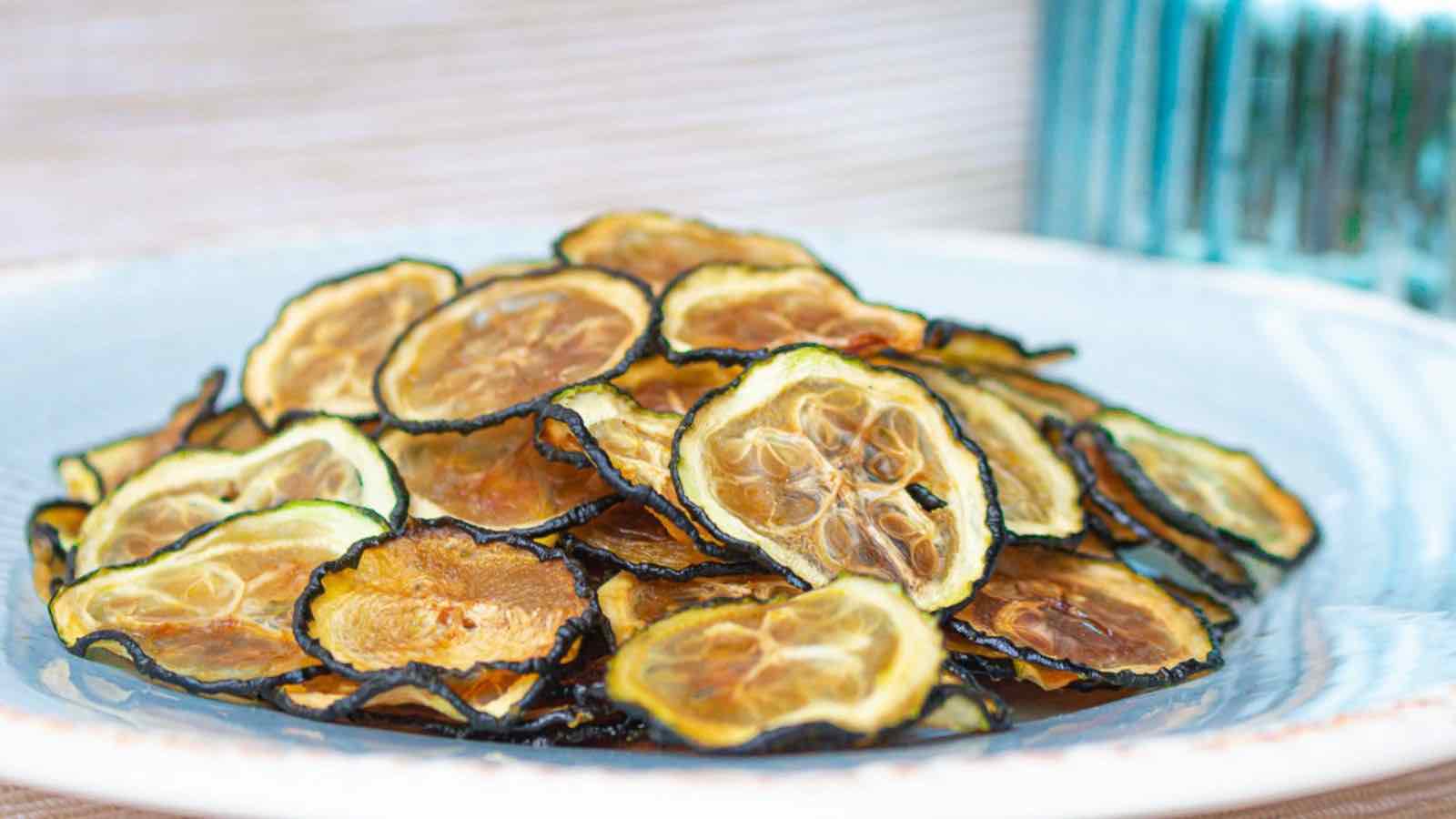 Zucchini chips on a plate.