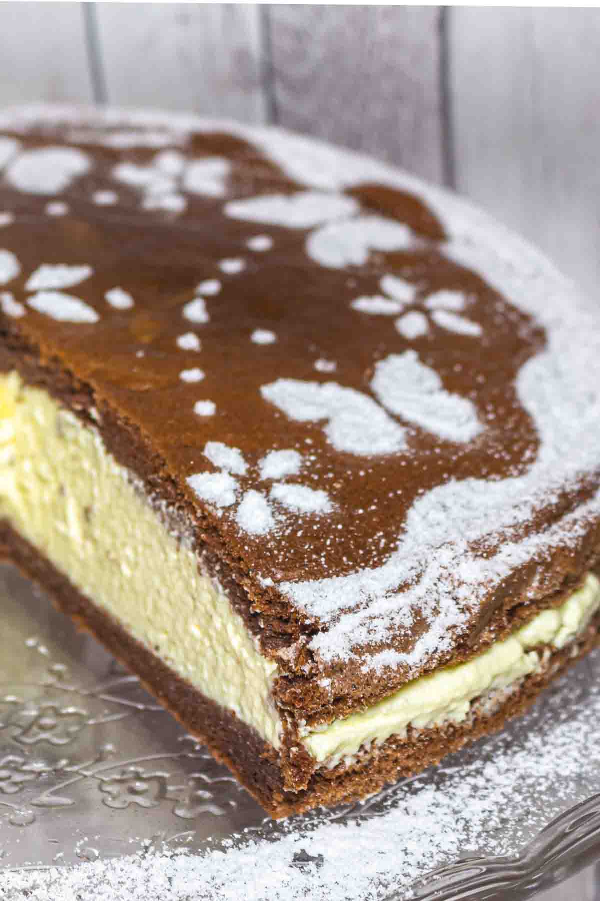 A cake with a slice taken out of it.