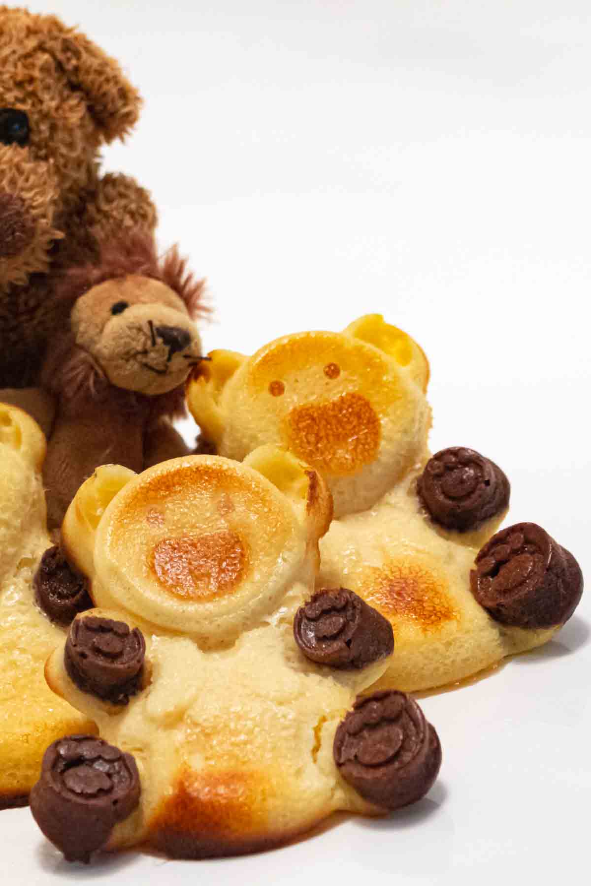 A teddy bear shaped cookie.