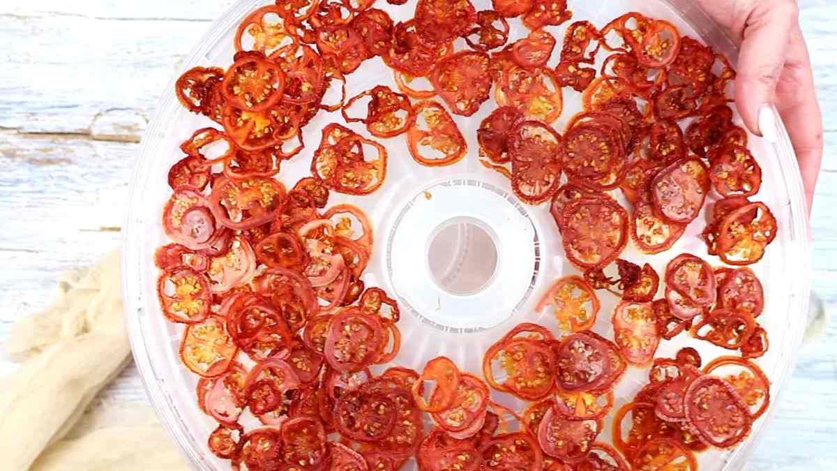Tray full of dried tomatoes.