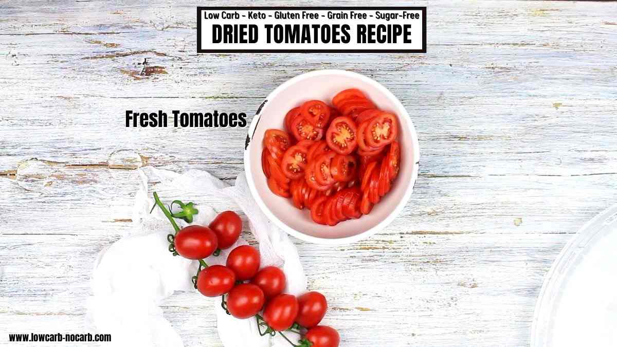 Tomatoes on a wooden table.