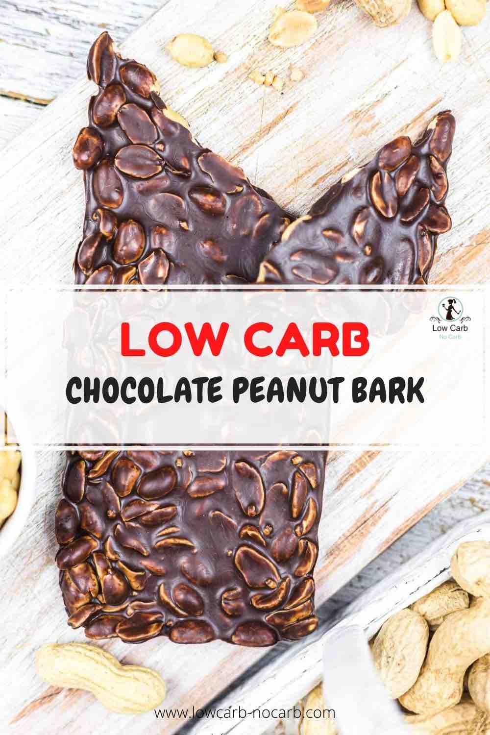 A piece of low carb chocolate peanut bark, displayed on a wooden surface.