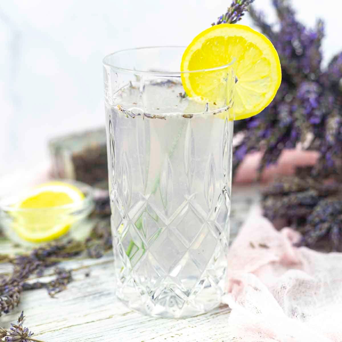 A tall, patterned glass filled with Sugar-Free Lavender Lemonade.