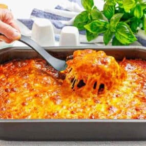 Baked eggplant parmesan casserole in baking dish.