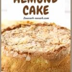 A round almond cake topped with sliced almonds is shown on a white surface with text indicating it is keto, low carb, grain-free, and gluten-free.