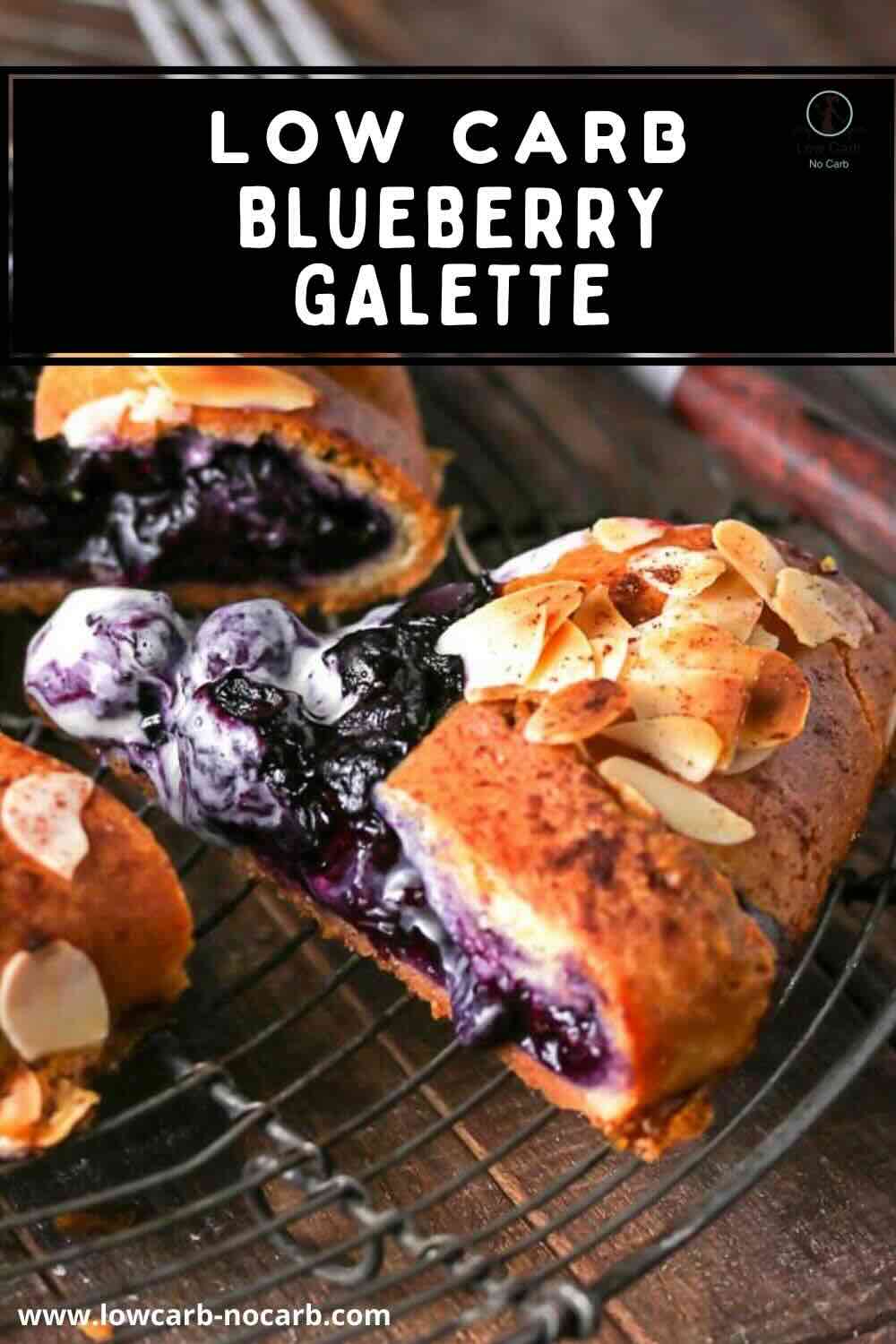 A sliced low-carb blueberry galette with almond flakes on a cooling rack. Blueberry filling is visible inside the pastry.