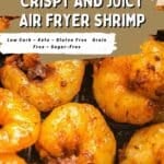 Close-up of crispy, golden shrimp cooked in an air fryer, with text highlighting that the dish is low carb, keto, gluten free, grain free, and sugar free.