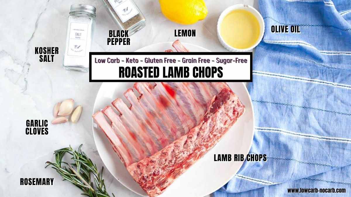 Ingredients for roasted lamb chops arranged on a white surface, including a rack of lamb, rosemary, garlic, kosher salt, black pepper, lemon, and a bottle of olive oil.