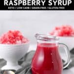 A glass pitcher of sugar-free raspberry syrup sits on a table with two bowls of crushed raspberries in the background. The text above highlights the syrup as keto, low carb, grain-free, and gluten-free.