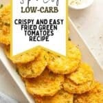 A plate of golden fried green tomato slices on a light surface with a recipe title overlay that reads, "Super Easy Low-Carb Crispy and Easy Fried Green Tomatoes Recipe.